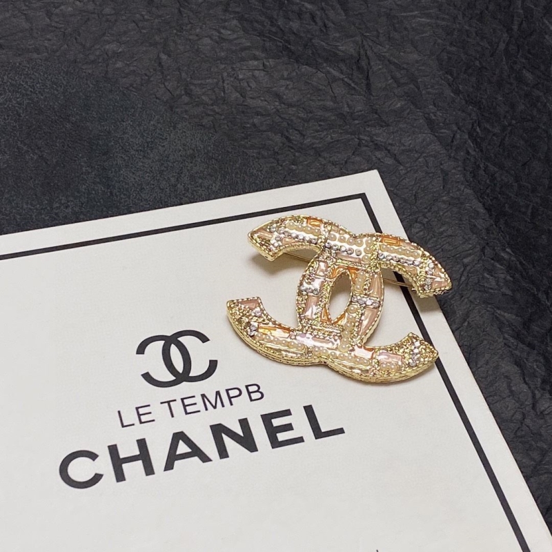 Ch**el brooches